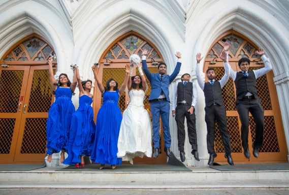 The smoke cascades from the ceiling, highlighting the twirling couple and a dramatic ambiance.