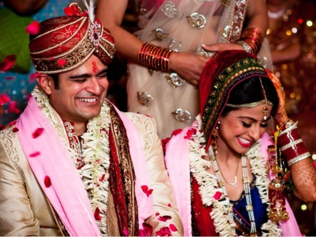 An elegant Indian wedding scene, featuring festive decorations and showing pre-wedding excitement.